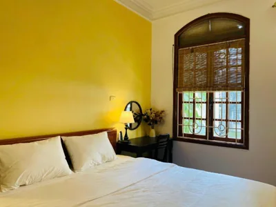 Deluxe Double Room with Balcony — The Autumn House - Homestay at To Ngoc Van